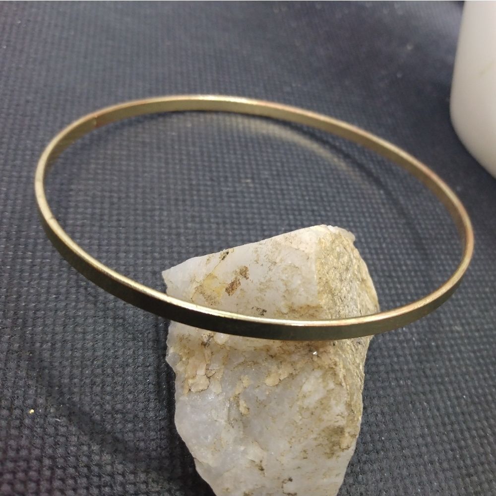 Gold‎ tone bangle